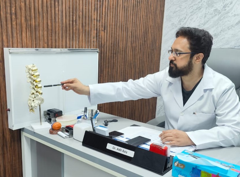 Dr. Adil Aziz Khan - Consultant Neurosurgeon